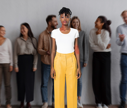 A woman with atopic dermatitis on her arm and face, looking into the camera with a crowd behind her